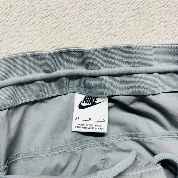Nike Sportswear Tech Unlined Woven Cargo Pants Mens 34 Gray Stretch Drawstring - Picture 5 of 10